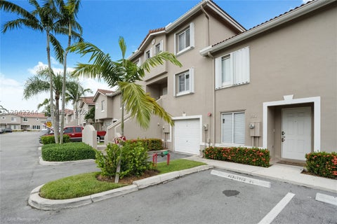 Photo of 221 Riviera Cir, Weston, FL 33326 (MLS # A12042244)