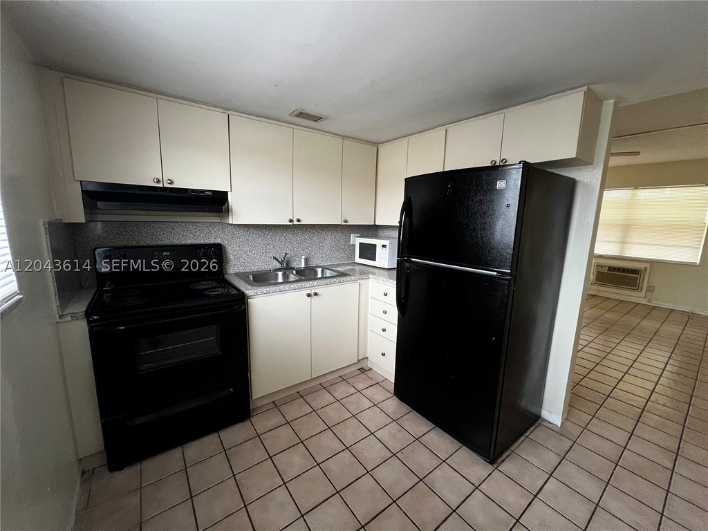 Photo of 13 NE 2nd Ave #104, Dania Beach, FL 33004 (MLS # A12043614)