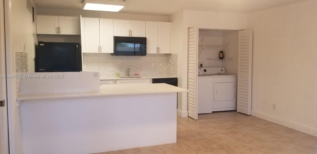 Photo of 635 Executive Center Dr #M103, West Palm Beach, FL 33401 (MLS # A11497585)