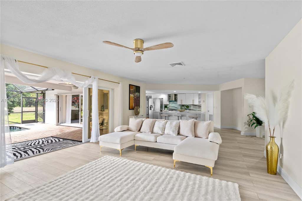 Photo of 5706 Guava Dr, Tamarac, FL 33319 (MLS # A11974951)
