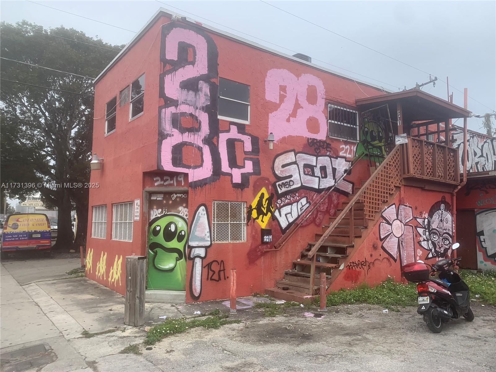 Retail building with 2/2 apartment on second floor. The property has approved plans to legalize and remove the unsafe structure violation. Excellent property for numerous types of businesses and a legal 2/2 upstairs for the owner to rent out or for an employee. Excellent location and high visibility on NW 28 ST. Call agent for details.