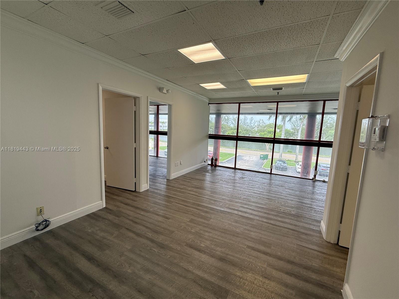 Beautiful 1,600 sqft office for lease in Doral, just steps from 25th Street. Located on the 2nd floor with a private entrance, this space offers 4 private OFFICES, a large main area, and a kitchen area. Elegant wood flooring throughout adds a warm, professional touch. Rent INCLUDES electricity and water.
Comes with 5 assigned parking spaces for convenience and accessibility. Ideal for professionals looking for a prime, visible location to grow their business.
?? Watch the YouTube video!