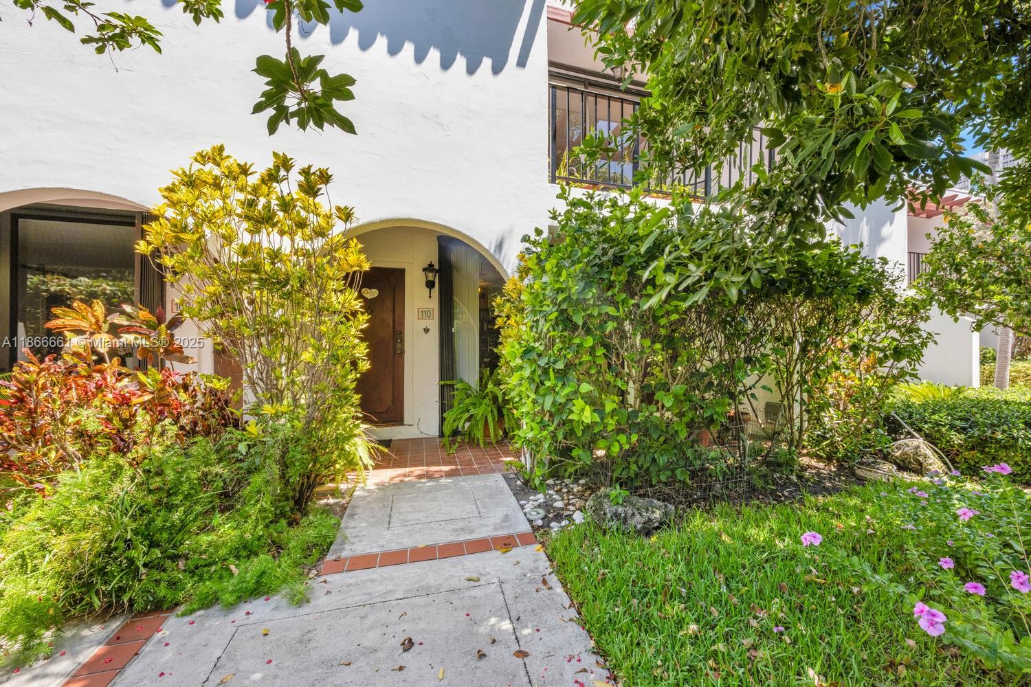 Spacious 2 Story 2/2.5 garden townhouse with 1404 square feet in the desired Grapetree Community of Key Biscayne. Townhouse has 2 large bedrooms upstairs, 2 bathrooms and balconies, open living/dining/family rooms downstairs, half bathroom, kitchen with tile floors throughout. Unit has an oversized enclosed patio/porch which is ideal for outdoor entertaining. Townhouse is just steps away from the beach with its own private direct beach access. Community has a large swimming pool, party room, brick paver parking lot, ample visitor parking and well maintained grounds. Just a short distance to restaurants, shops and Bill Baggs State Park.