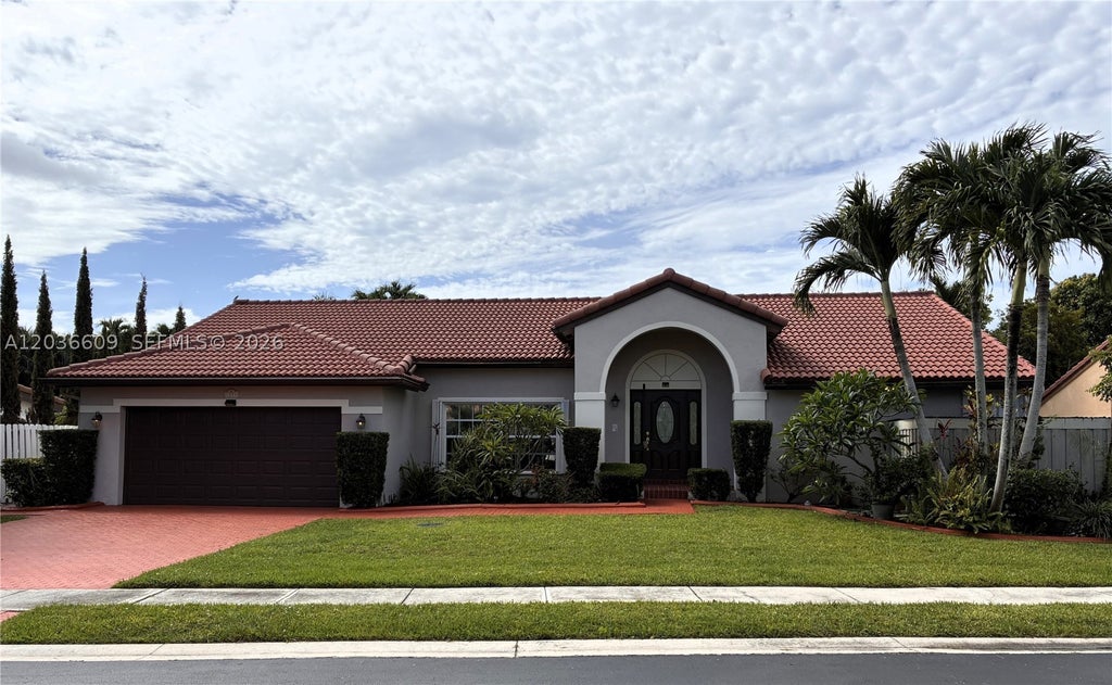 Photo of 1334 NW 127th Dr, Sunrise, FL 33323 (MLS # A12036609)