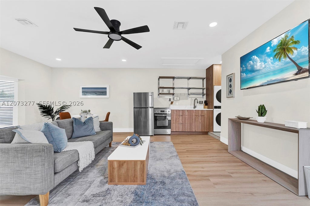 Photo of 10430 Sunset Strip #S, Sunrise, FL 33322 (MLS # A12073277)
