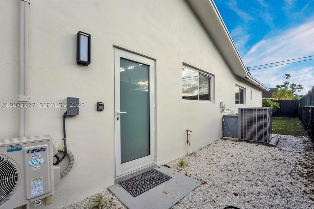 Photo of 10430 Sunset Strip #S, Sunrise, FL 33322 (MLS # A12073277)