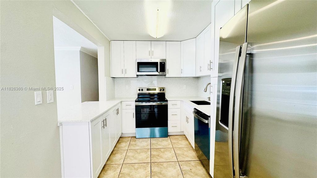 Photo of 531 SW 38th Ter #A, Fort Lauderdale, FL 33312 (MLS # A11826360)