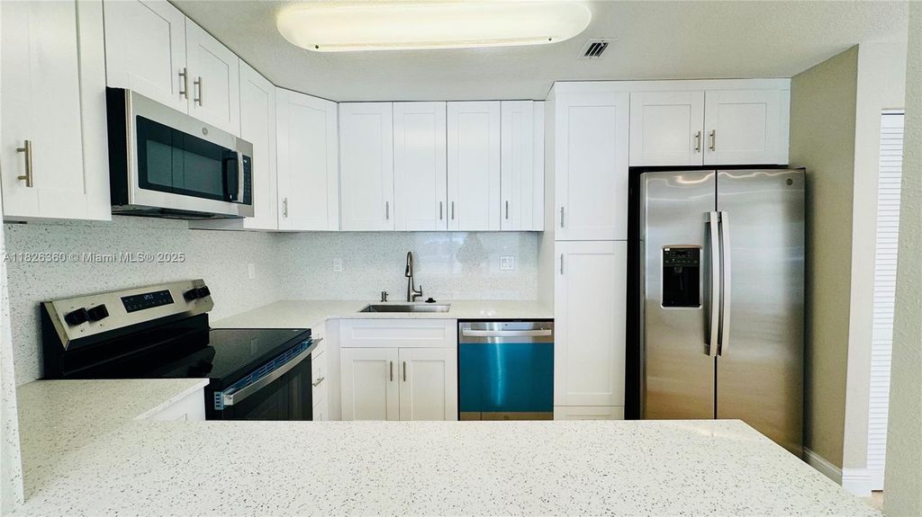 Photo of 531 SW 38th Ter #A, Fort Lauderdale, FL 33312 (MLS # A11826360)