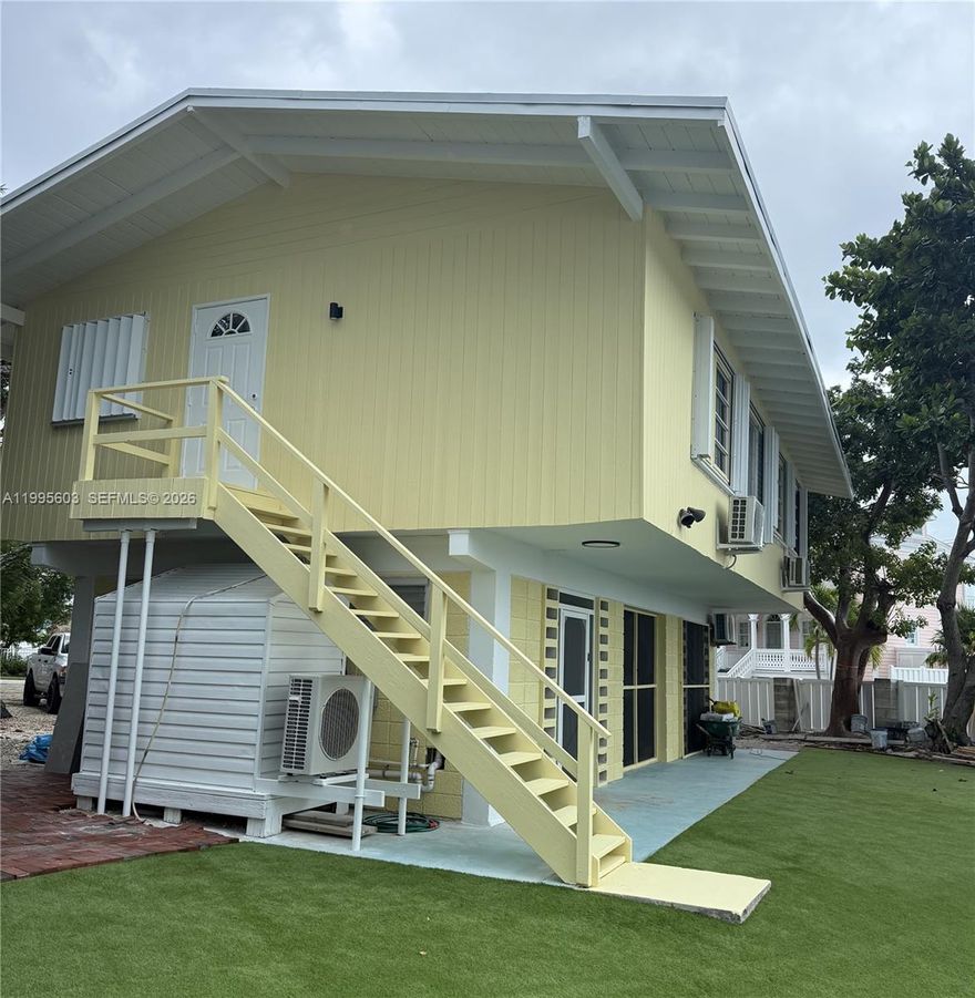Waterfront living at its best! 7,500 sq ft lot with 60 ft of canal frontage and direct ocean access—perfect for boating and fishing enthusiasts. Enjoy open ocean views, a charming tiki hut for entertaining, and a 20,000 lb boat lift ready to use. Ideal as a vacation home, investment, or future dream build in a highly desirable Florida Keys location just minutes from dining and shopping.