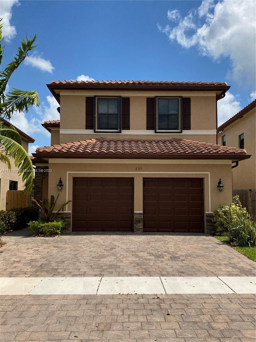 Beautiful lakefront home. Excellent open floor plan with vaulted ceilings. This two story home features a formal living and dining room, an open kitchen with SS appliances, family room, half bath, two car garage with extended driveway on a Cul de sac street; the patio is completely fenced in with Guanabana trees, and has amazing lake views. The second floor offers 3 bedrooms, 2 baths and a laundry room. House is located at the gated community of Barbados in The Isle of Bayshore. Amenities include a clubhouse with a private room for parties, gym, a resort style pool, a splash pad and playground.