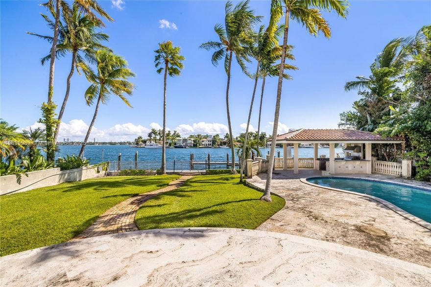 Situated on an expansive 16,470 SF lot with 90 feet of bay frontage, 617 E Dilido is a refined waterfront retreat. The residence offers spacious living and dining areas filled with natural light, a well-equipped kitchen, and comfortable bedrooms. Large terraces, an outdoor kitchen, and a generous pool deck create a seamless indoor-outdoor lifestyle framed by panoramic Biscayne Bay views. Perfect for entertaining or relaxing in privacy, this home offers exceptional comfort and a prime Miami Beach location just minutes from world-class dining, culture, and the vibrant energy of the city.