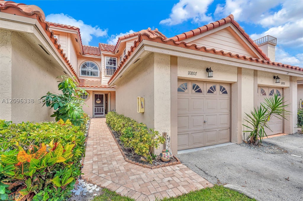 Photo of 10807 Cypress Glen Dr #10807, Coral Springs, FL 33071 (MLS # A12096338)