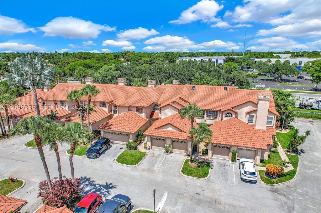 Photo of 10807 Cypress Glen Dr #10807, Coral Springs, FL 33071 (MLS # A12096338)