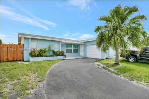 Photo of 8960 Sunset Strip, Sunrise, FL 33322 (MLS # A12101507)