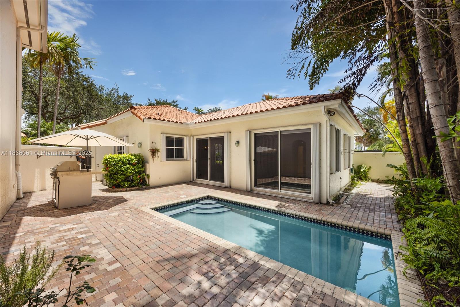 Located in the exclusive, guard-gated community of Harbor Islands, this 3-bed, 2-bath residence features 11’ vaulted ceilings, a split floor plan, and oversized picture windows that bathe the interiors in natural light. The kitchen and bathrooms are stylishly remodeled, complemented by a private backyard with a heated dipping pool and built-in grill. Residents enjoy resort-style amenities including a clubhouse, fitness center, marina with slips for rent, tennis, pickleball, basketball, playgrounds, and open green spaces—all minutes from the beach, FLL, and premier shopping.