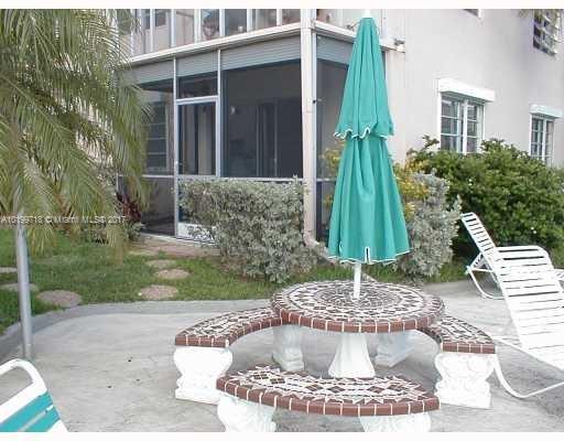 First floor 2 bedroom 2 full bath corner unit with direct water views. Walk out to dock and pool. Washer/dryer in unit. Parking space is tandum, enough for 2 cars. Secure building. Closing to airport, beach, downtown and plenty of shopping and restaurants. Boat dockage thru the association when available. Easy to show.
