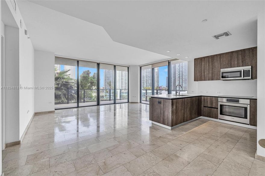 Discover this bright and spacious 2-bedroom, 2.5-bath corner unit located in the vibrant heart of Brickell. Impeccably maintained and move-in ready, the residence showcases premium finishes throughout. The open-concept layout seamlessly connects the living, dining, and kitchen areas, creating a welcoming and modern atmosphere. Both bedrooms are generously sized, and the expansive balcony offers sweeping city views. Residents enjoy access to outstanding amenities, including a state-of-the-art fitness center, infinity pool, 24/7 concierge service, children’s play area, covered parking, and valet. Situated within Brickell City Centre, you're just steps away from world-class shopping, fine dining, and top-tier entertainment.