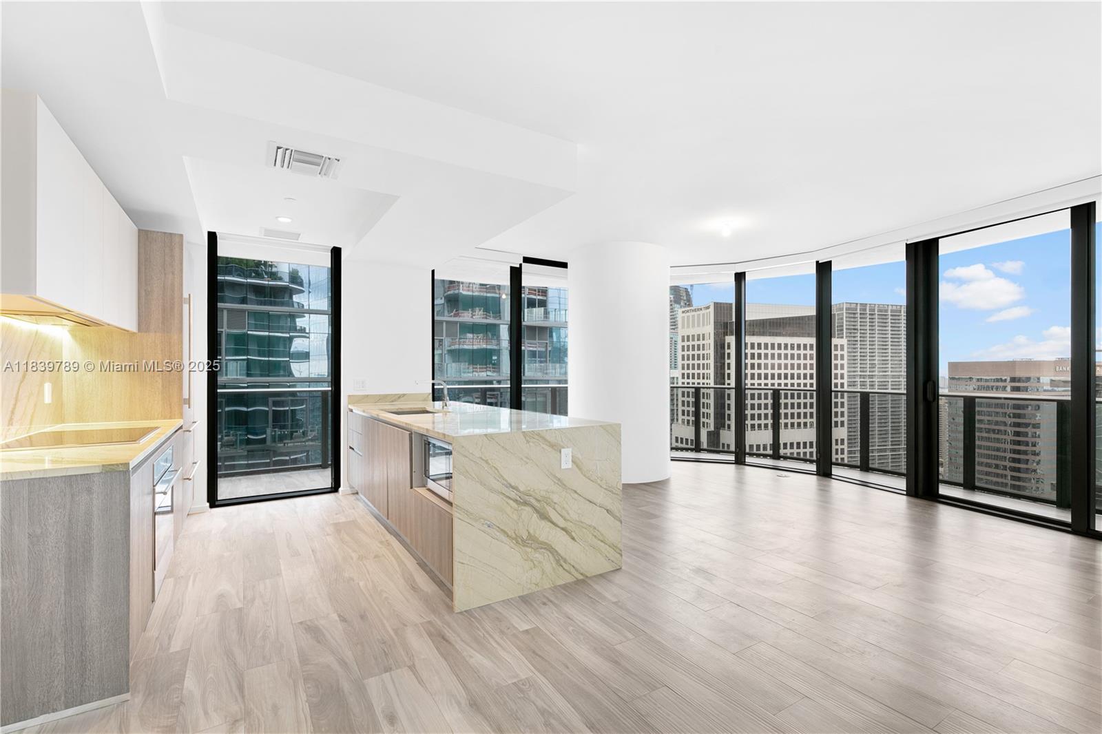 Location location location! Luxury living awaits you at the SLS LUX. This 2 bed 2 bath Designer upgraded corner unit is located on the 41st floor in one of the most desirable buildings in Brickell. SLS LUX offers fantastic amenities including an Outdoor Sky-lounge, rooftop pool, and services designed to indulge its residents. This unit has blackout shades in all the rooms, Subzero and Wolf Appliances, and a large wraparound balcony. Pamper yourself at the Ciel Spa and enjoy a full-service fitness center with rock-climbing walls, and a combined tennis and basketball court. Walk across the street to Brickell City Centre and many restaurants/ bars that Brickell has to offer. 2 assigned parking spaces (1 is a lift) included plus valet for your guest. Do not miss this great opportunity!