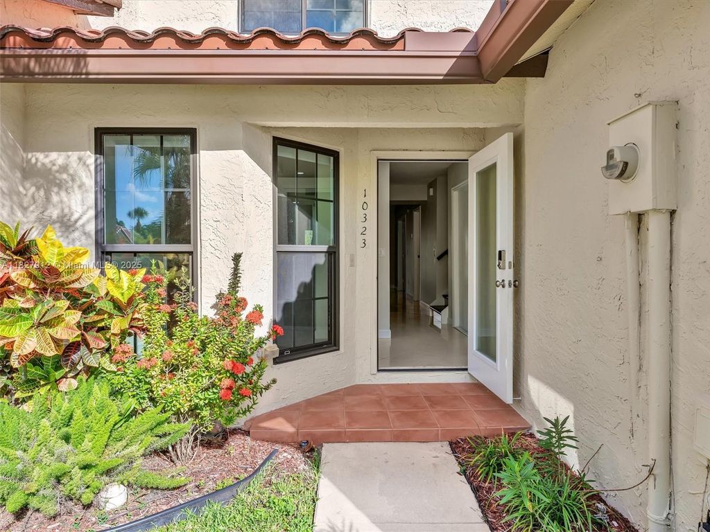 Photo of 10323 Hidden Springs Ct #10323, Boca Raton, FL 33498 (MLS # A11827912)