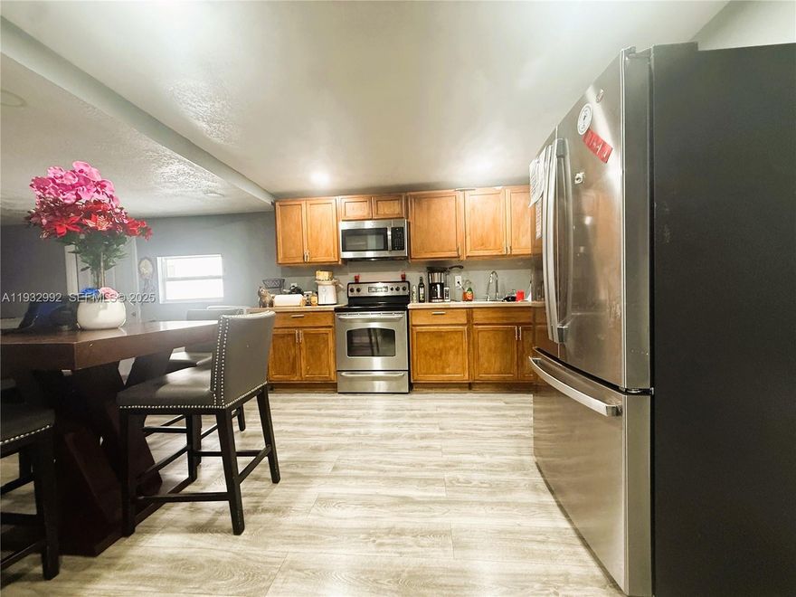 Rare opportunity to own a fully remodeled 4-bedroom, 2-bathroom manufactured home where you own the land with NO HOA and no lot fees! This home has been renovated for 2025 living, featuring a brand-new AC system, updated plumbing, and stylish laminate flooring throughout. Interior include upgraded kitchen and completely renovated bathrooms. Ideally located for convenience, you are just 10 minutes from Sawgrass Mills Mall and minutes away from major highways and local shopping. Whether you are looking for a turnkey primary residence or a high-potential investment property, this home is priced to sell fast!! Schedule your showing today!