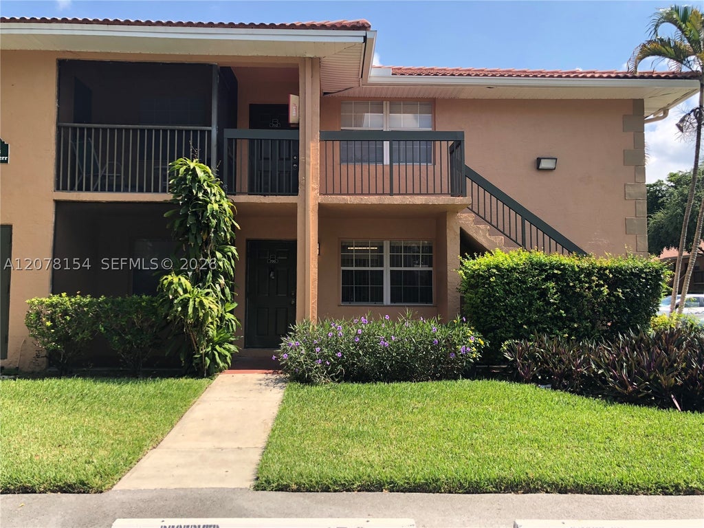 Photo of 700 NW 103rd Ter #101, Pembroke Pines, FL 33026 (MLS # A12078154)