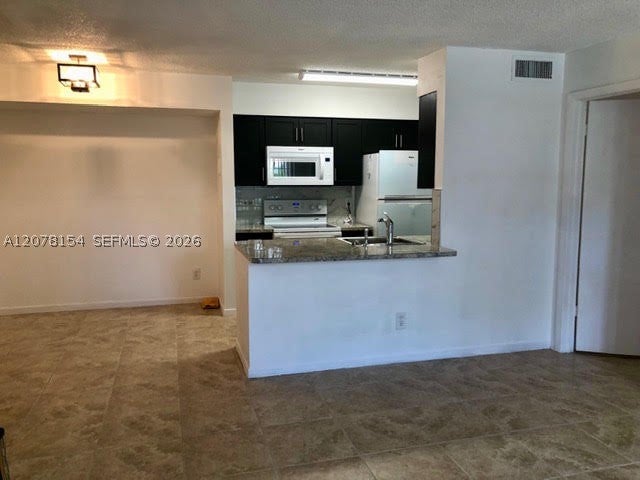 Photo of 700 NW 103rd Ter #101, Pembroke Pines, FL 33026 (MLS # A12078154)