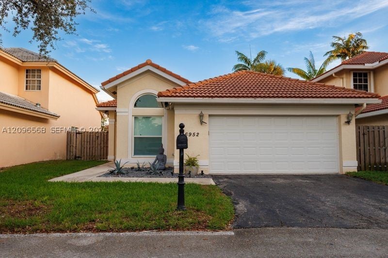 Photo of 6952 NW 27th Ct #6952, Margate, FL 33063 (MLS # A12096568)