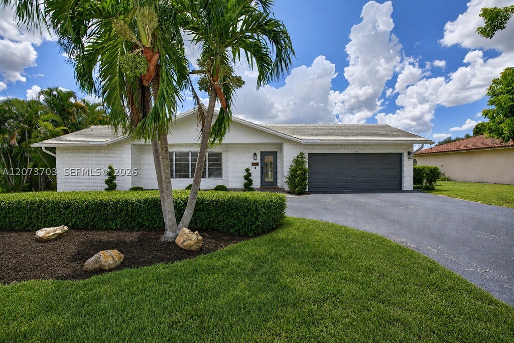 Photo of 3200 NW 114th Ter, Coral Springs, FL 33065 (MLS # A12073703)