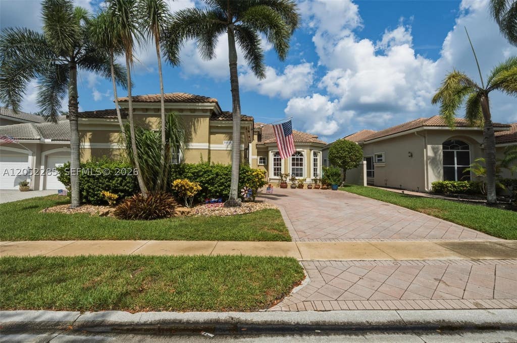 Photo of 5818 NW 126th Ter, Coral Springs, FL 33076 (MLS # A12052285)