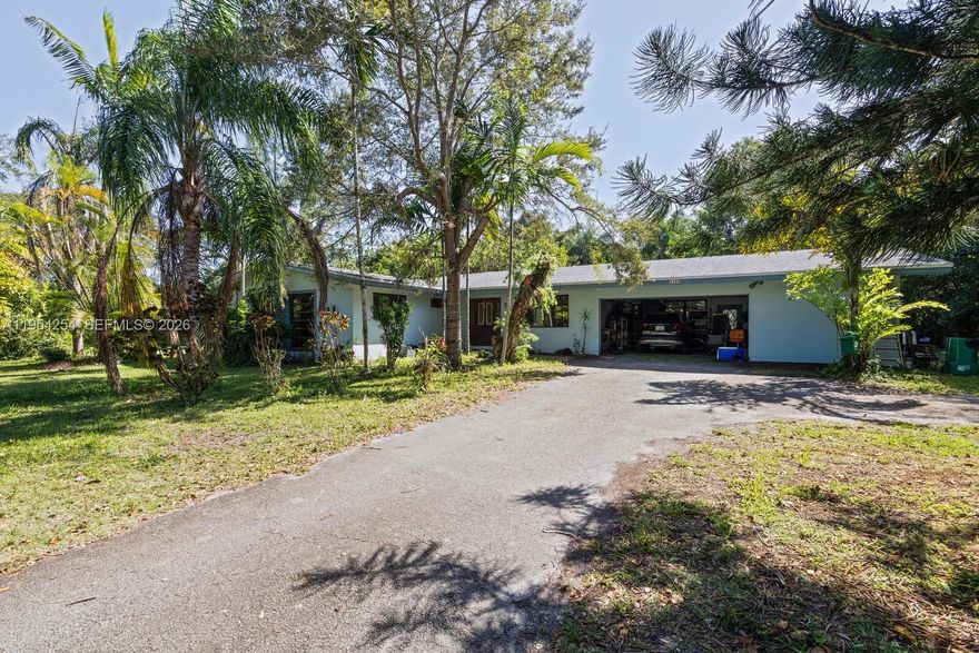Incredible opportunity to own a single family home with endless potential in a highly desirable neighborhood in unincorporated Miami-Dade county. This property features 3 bedrooms, 2 bathrooms, 1 car garage, all situated on a spacious 1 acre lot. The property is sold "as is", making it the perfect prospect for a savvy buyer to create their dream home. The true value of this property lies in the land, making it a fantastic option for the a builder or investor looking to capitalize on the potential of this prime location. With a little version and creativity, this property has the potential to become a stunning masterpiece that stands out in the neighborhood. Don't miss out on this chance to own a piece of real estate with endless possibilities. Please call listing agent with any questions.