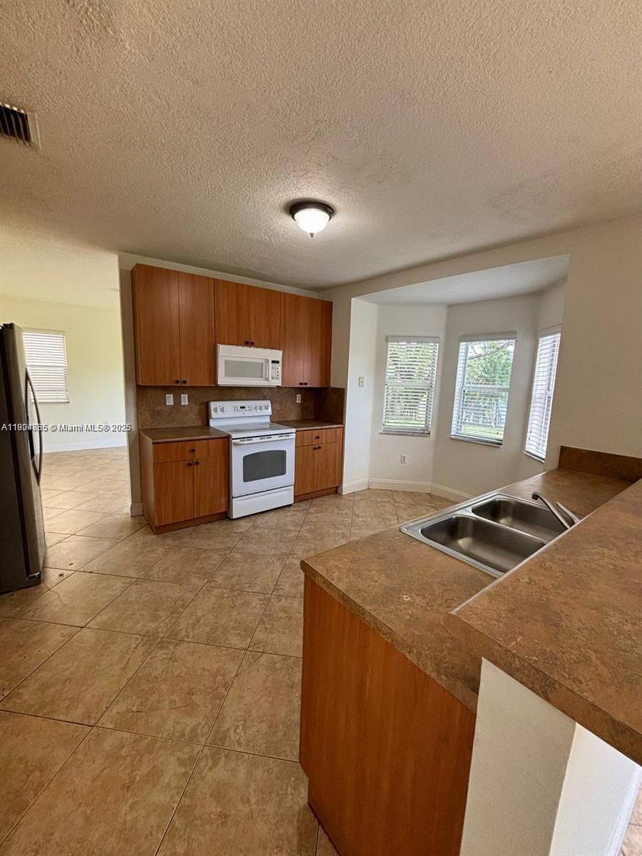 PELICAN BAY AT OLD CUTLER - Residential Lease