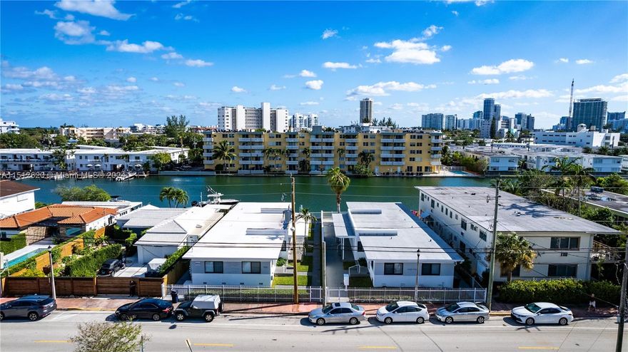 Best of both worlds! Nestled between Biscayne Point & Stillwater, Nobe Island is the perfect development site, offering immediate cashflow until ready to start construction. This waterfront multifamily features 8 fully renovated units – including impact windows, new roofs, renovated kitchens with quartz countertops and SS appliances, new baths, and en-suite laundry. The sale of this income producing property includes approved plans to build 14 units, good thru 2028, with 100% construction documents. Just bring your GC and apply for permits.  Benefit from all the major improvements coming to North Beach, including a bustling Town Center, the new Byron Carlyle Theater, and other major public improvements coming to the area. Seize the chance to be part of the renaissance of North Beach.