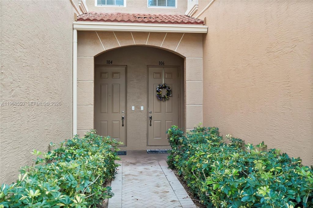 Photo of 4870 Bonsai Cir #106, Palm Beach Gardens, FL 33418 (MLS # A11968550)