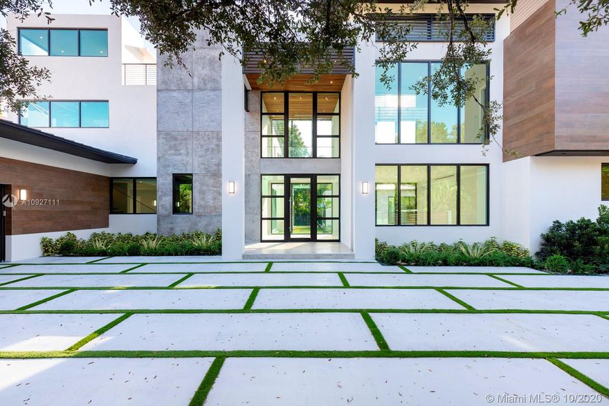 A perfectly-crafted, modern new construction home in the heart of South Miami’s High Pines neighborhood. This 6/7.5 home has it all: a spectacular entryway with a 10-ft door and 10+ft ceilings throughout the first floor; a grand, open kitchen with custom cabinetry and appliances from Mia Cucina; impeccably-designed bathrooms and custom closets; an elevator; rooftop deck with summer kitchen; smart-home technology throughout; and a dedicated home gym with sauna and steam rooms. The home is centered around a resort-like pool that can be seen from almost every room in the house. Incredible construction and a prime location make this an unparalleled offering.