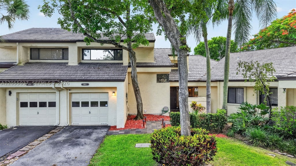 Photo of 381 NW 94th Ter, Plantation, FL 33324 (MLS # A12055037)