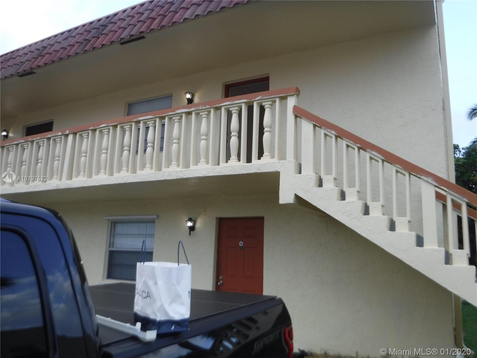 Upgrade Second Floor Corner Condo 2 beds 1,5 bathroom, Granite Counters in Kitchen and Bathroom, Tile and Laminate floor, Wash and dryer inside the unit.