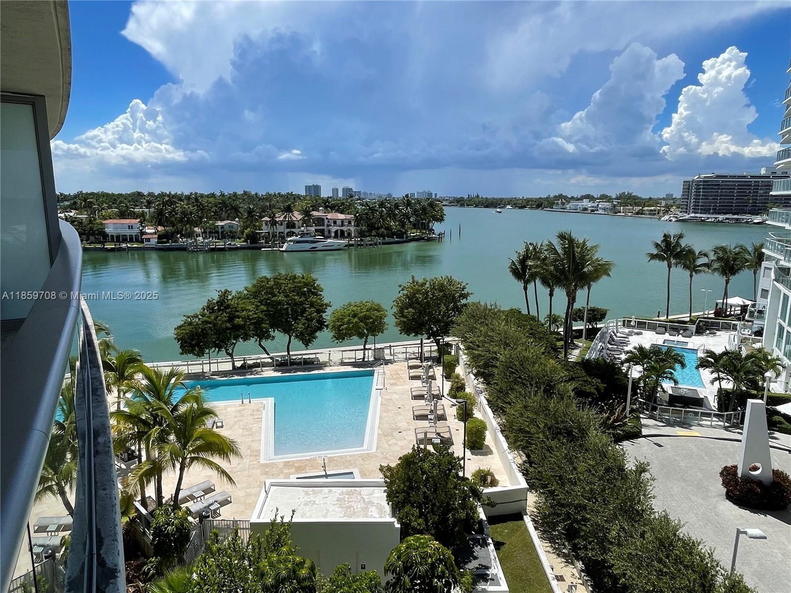 Sleek and sophisticated 2BD/2BA at Peloro, the boutique bayside gem by renowned architect Luis Revuelta. Enjoy tranquil bay and pool views, just steps from the sand with beach access across the street. This light-filled residence boasts floor-to-ceiling windows, contemporary finishes, and an airy open layout. Peloro’s curated amenities include a dramatic grand atrium with waterfalls, waterfront pool, fitness center, concierge, and valet-only parking. An exceptional lifestyle purchase and smart investment, allowing rentals up to 12 times per year.