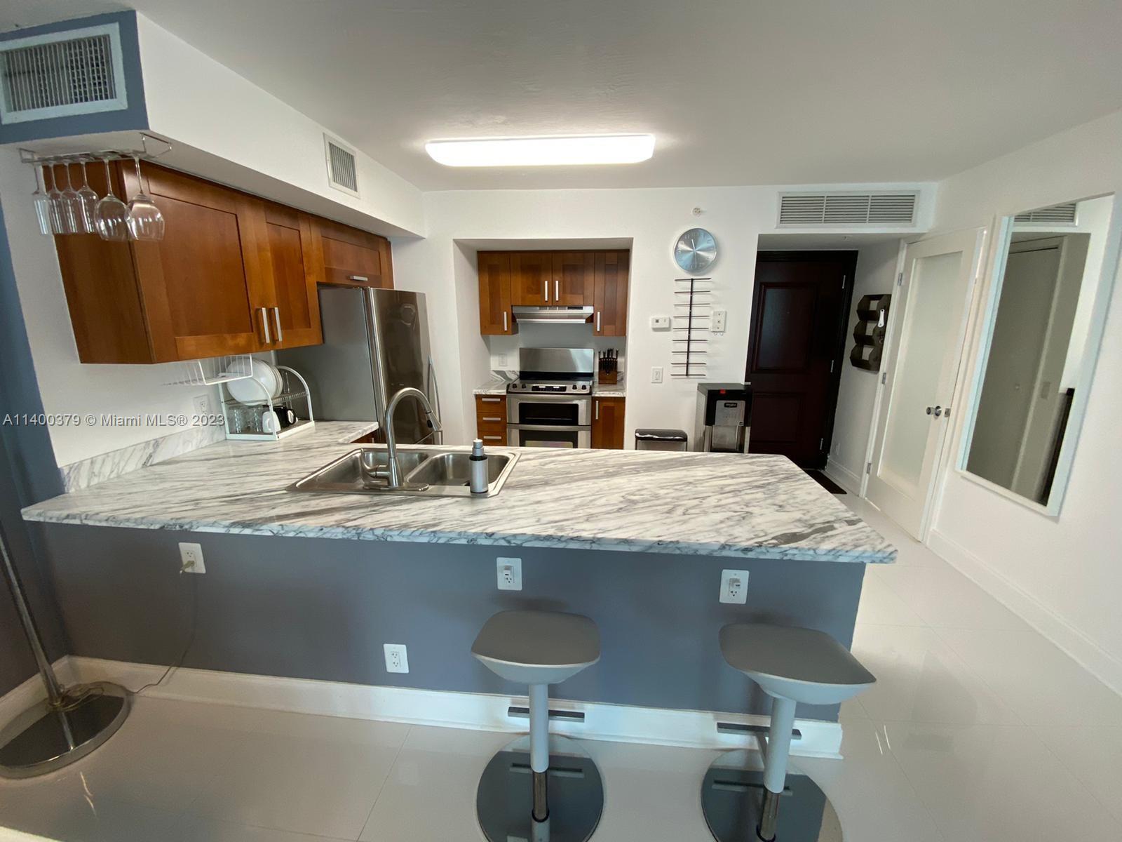 Prime location! Oceanfront luxury condo. One block from world famous Bal Harbour Shops and Restaurants. This is a 1 bedroom with Large den which is currently used as a second bedroom. Two full bathrooms. New washer and dryer in the unit. Impact windows and sliding doors. European style kitchen. Fully furnished. Was never rented before. Walk-in closet. Beach service included in rent. Hurry, this one will be rented fast.