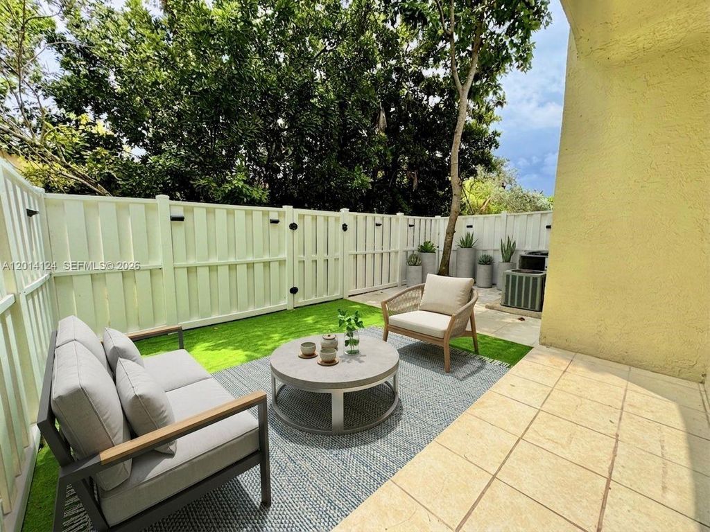Photo of 3670 NW 91st Ln #3670, Sunrise, FL 33351 (MLS # A12014124)