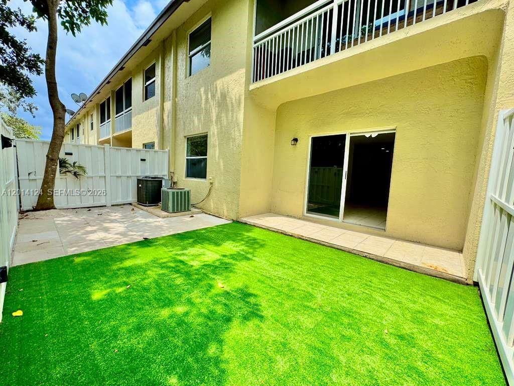 Photo of 3670 NW 91st Ln #3670, Sunrise, FL 33351 (MLS # A12014124)