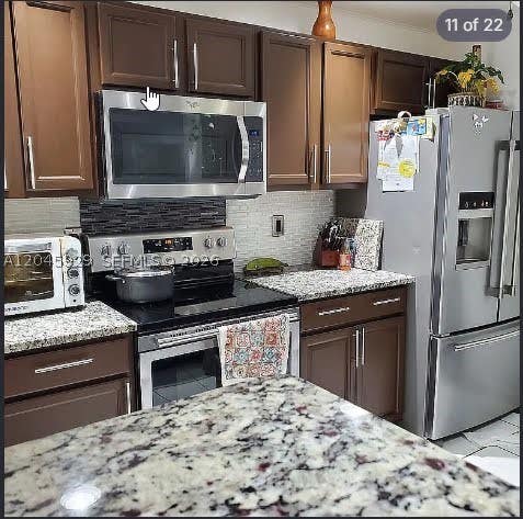 Photo of 132 Sparrow Dr #B, Royal Palm Beach, FL 33411 (MLS # A12045929)