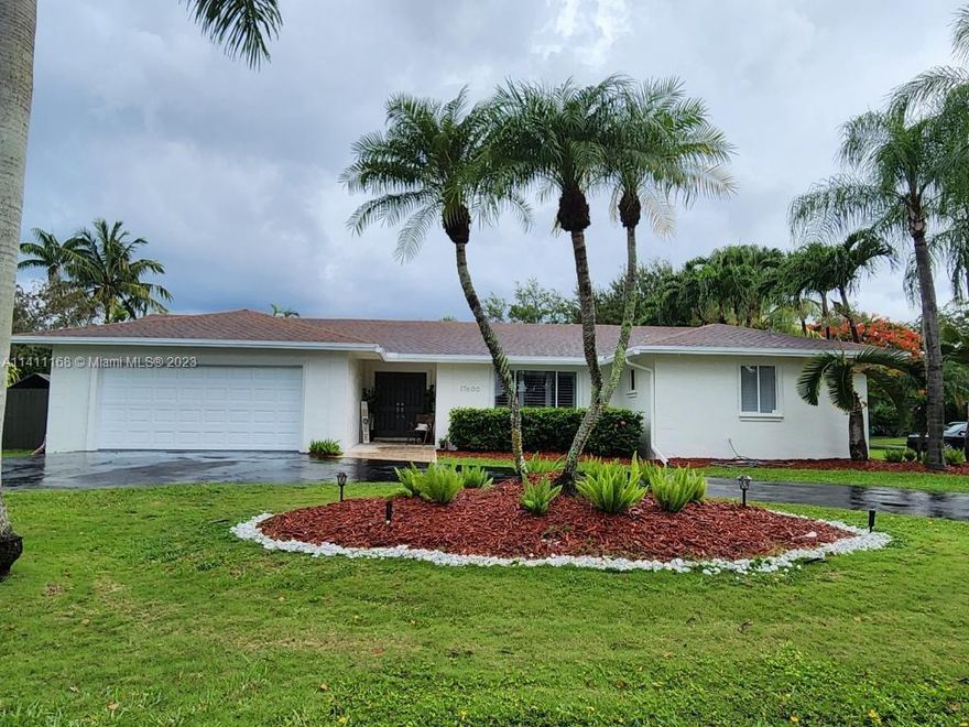 Location, Location, Location!!! Welcome home to this exquisite turnkey 4/3 home centrally located in the charming Village of Palmetto Bay. Sitting on an oversize corner lot, you will find this family-oriented neighborhood right for you. Near-by top-rated Private and Public schools. This home boasts large tile throughout main areas, laminate/wood flooring in the bedrooms, completely updated en-suite, plantation shutters and large kitchen with island. Step outside to your fully fenced in back yard with plenty of space for a boat, RV’s and more. Best of all you can enjoy the benefits of a sparkling, salt water pool, with newly installed diamond brite, a new pool pump, updated travertine tile for those hot summer days! No HOA! Sellers motivated. Call today!