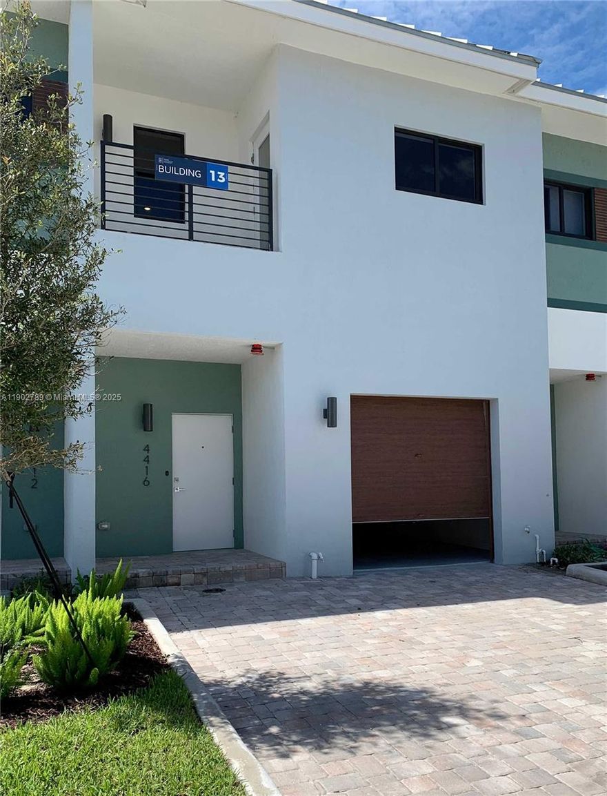 This beautiful 2-story townhouse is located in the desirable gated community of Strata at Plantation. High ceilings and an open floor plan create a bright and elegant atmosphere throughout the unit. The kitchen with sleek European cabinetry, stainless steel appliances, and a signature island is perfect. Designer bathrooms and contemporary finishes add a luxurious touch. Ceramic tile on the main level and plush carpeting upstairs.  The primary suite features a spa-like bathroom, a closet, and a private balcony. The 2 bedrooms are filled with natural light. Sliding glass doors from the living room open to a common garden area, ideal for outdoors.  Close to The clubhouse.