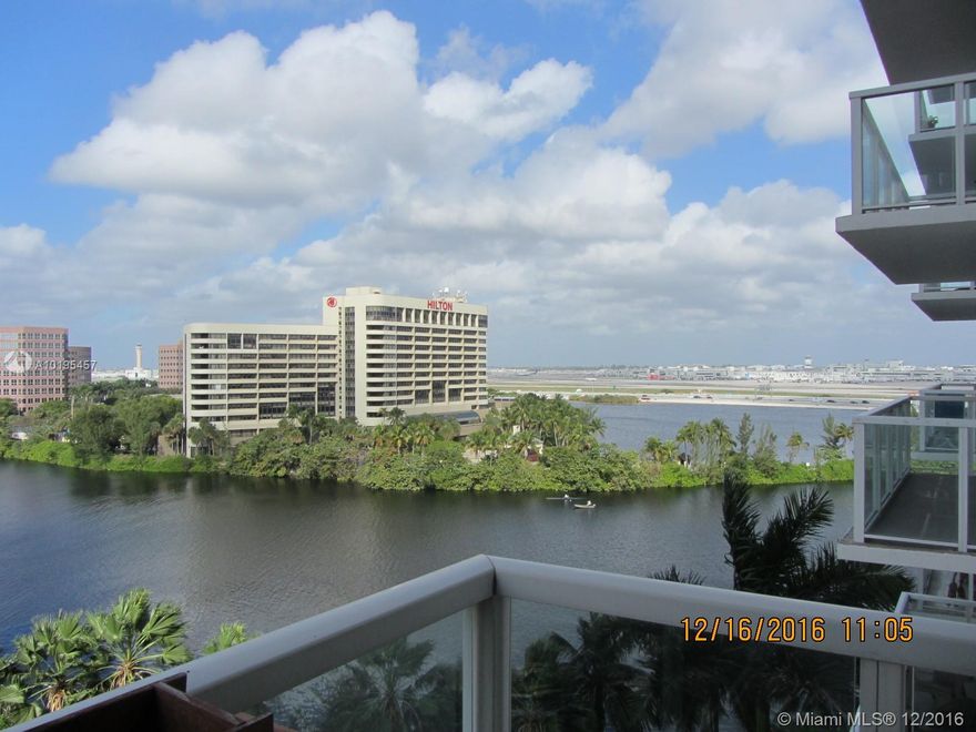 Impeccable unit with open views to lagoon and community pool. Fully updated with marble and wood floors. 2 split bedrooms/baths. Walk-in closets, ideal kitchen, washer/dryer in unit. Amenities galore: jet ski dock, clubhouse, gym, sauna, Olympic pool, convenience store and more...Minutes from airport, Coral Gables and expressways. Easy to show. 1 car garage #G23.