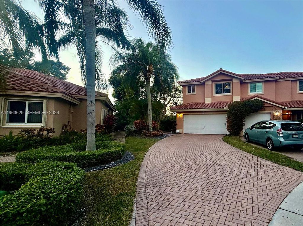 Photo of 5772 NW 127th Ter, Coral Springs, FL 33076 (MLS # A11963629)