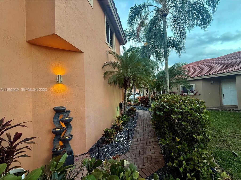 Photo of 5772 NW 127th Ter, Coral Springs, FL 33076 (MLS # A11963629)