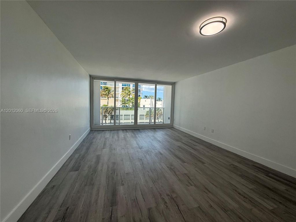 Photo of 3505 S Ocean Dr #310, Hollywood, FL 33019 (MLS # A12012060)