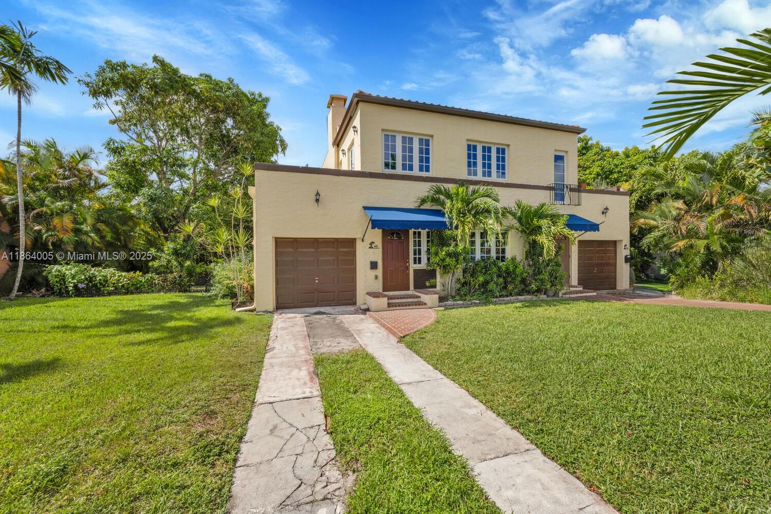 Experience exceptional living in this well-maintained, freshly painted 2-bedroom, 1-bath unit located on the first floor of this charming multifamily/triplex property in North Gables. Step into a welcoming foyer featuring original mosaic flooring, leading to an expansive living room featuring refinished original wood floors, charming fireplace & formal dining area. Impact windows & doors, in-unit laundry room with full size washer & dryer. Relax or entertain in the shaded patio, ideal for barbecues & outdoor gatherings. Two dedicated parking spots are included in the driveway. This home is located just minutes from the vibrant restaurants, shopping & nightlife of Miracle Mile, & near Miami International Airport & Downtown/Brickell. Water & landscaping is included in the rent.