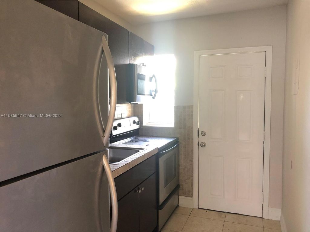 Photo of 2821 NW 12th Ct #1, Fort Lauderdale, FL 33311 (MLS # A11585947)