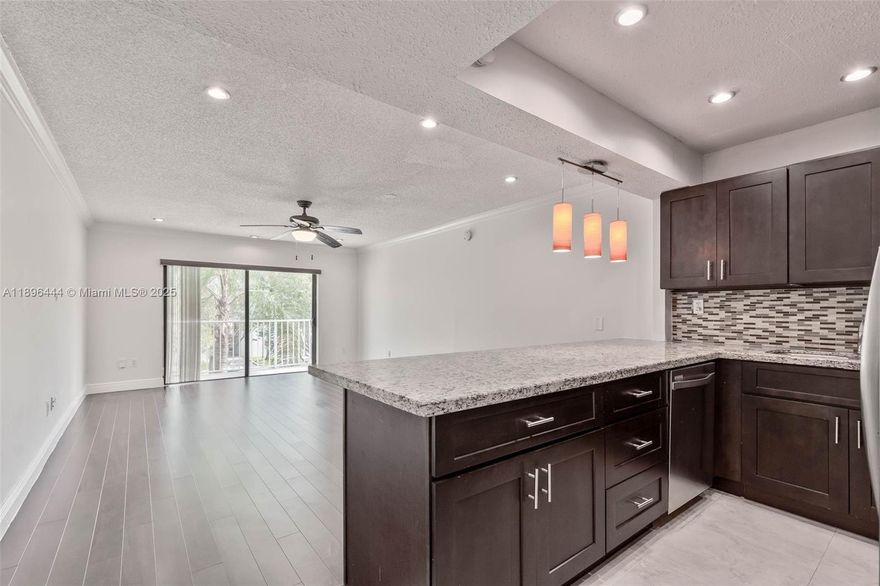 AVAILABLE NOW! Move right into this vacant and updated corner unit in Wisperwood Village, located just steps from Baptist Hospital and very close to Downtown Dadeland, the Metrorail, and the expressway.  This light and bright unit features in-unit washer/dryer, a kitchen with granite countertops and stainless steel appliances, a large walk-in closet, and a beautifully remodeled bathroom. The complex offers very quick approvals and includes a lovely pool and tennis courts. Pet friendly!